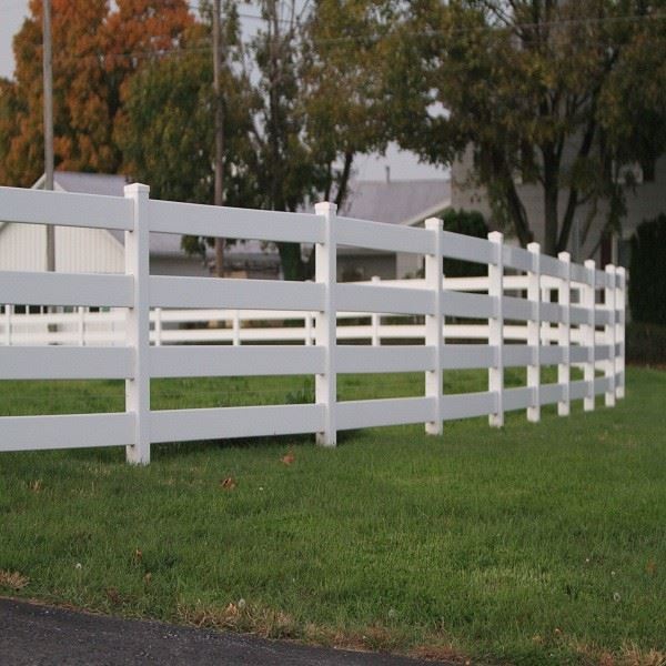 PVC split rail fence detail White PVC split rail fence close up showing rail to post connection detail and smooth maintenance free surface